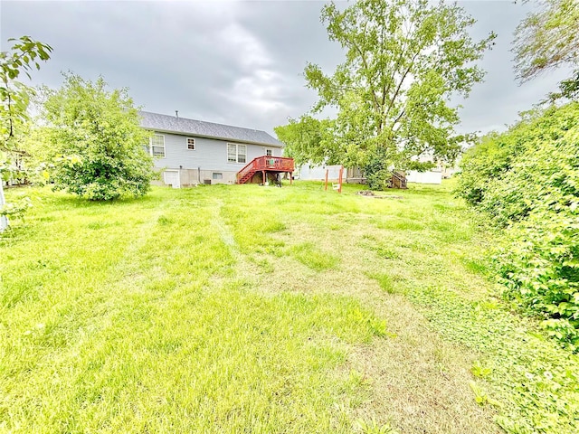view of yard with a deck