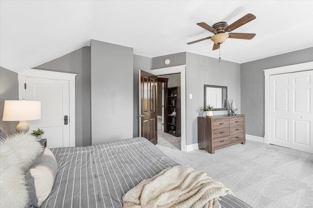 bedroom with carpet floors, baseboards, and a ceiling fan