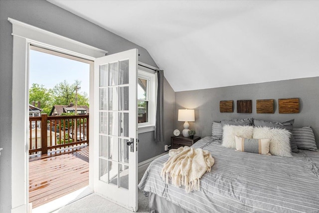 bedroom featuring lofted ceiling
