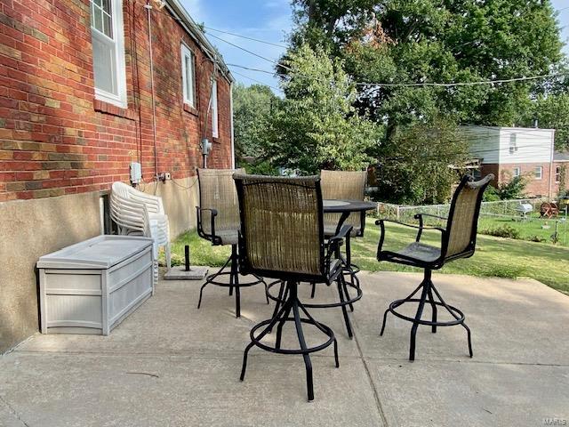 view of patio with outdoor dining area