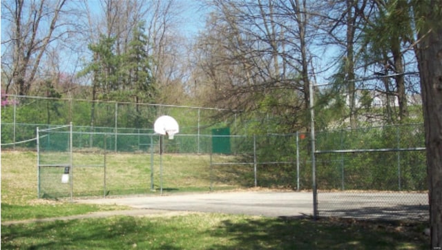 exterior space with fence and community basketball court