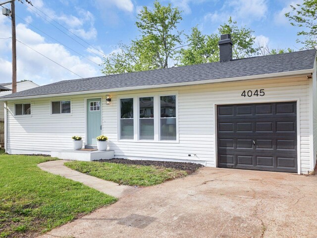 single story home with a chimney, a front yard, roof with shingles, concrete driveway, and an attached garage