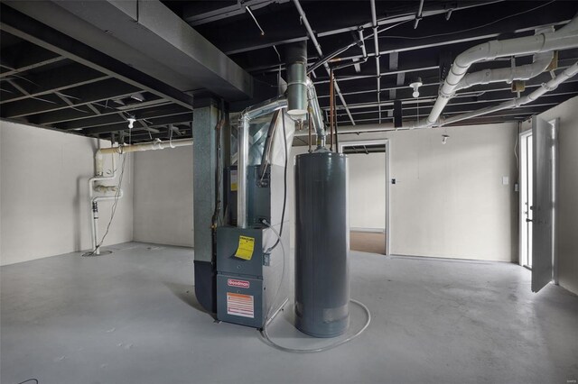 unfinished below grade area featuring gas water heater