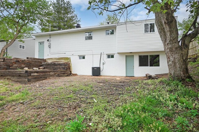 back of house with stucco siding