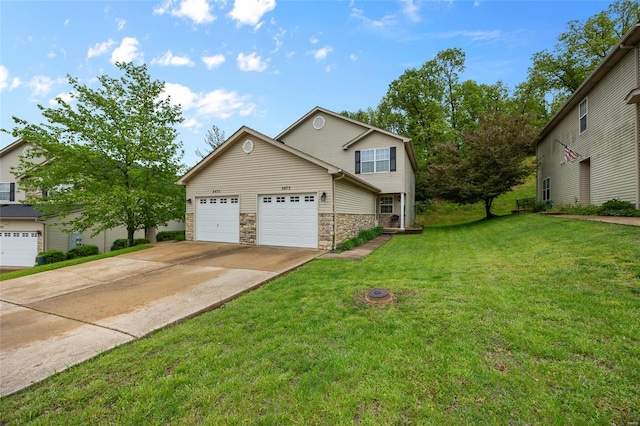 view of front of home with concrete driveway, a front lawn, stone siding, and a garage