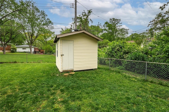view of shed featuring a fenced backyard