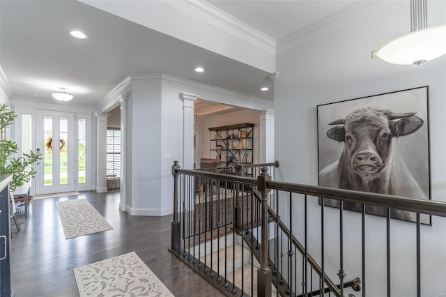 corridor with recessed lighting, an upstairs landing, ornate columns, ornamental molding, and wood finished floors