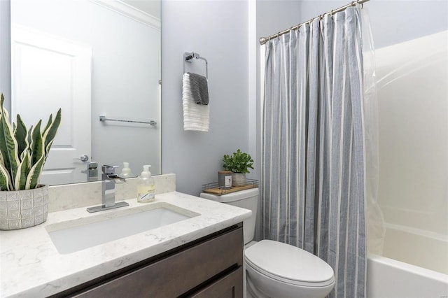bathroom with shower / bath combo with shower curtain, toilet, and vanity