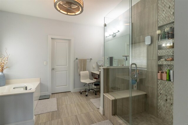 bathroom with a stall shower and a bath