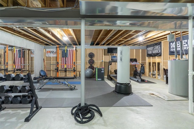 exercise room featuring water heater