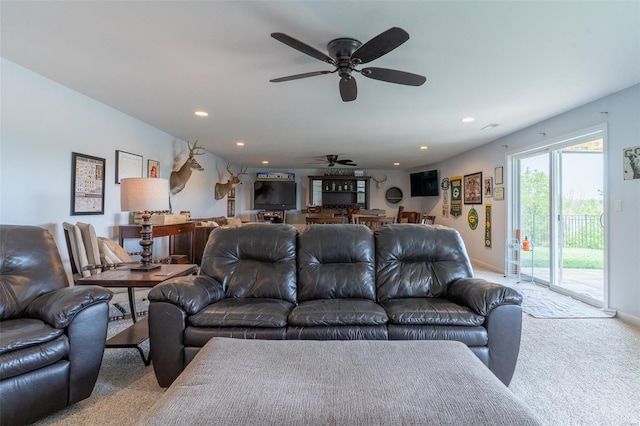 carpeted living area featuring recessed lighting, ceiling fan, and baseboards