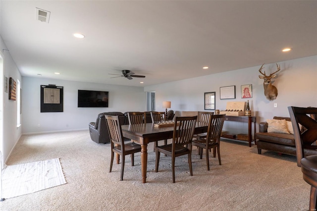 dining room featuring recessed lighting, ceiling fan, light colored carpet, and visible vents