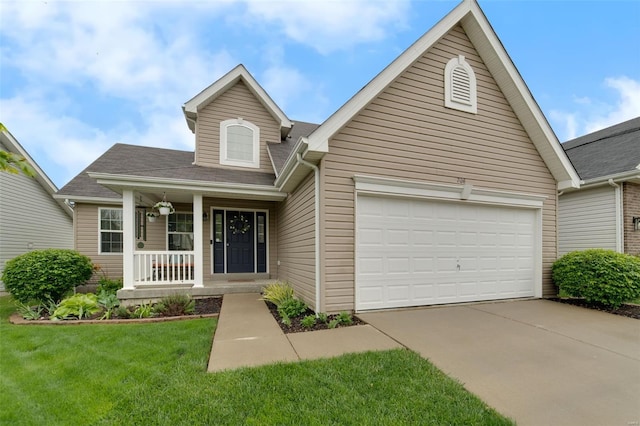 traditional-style house featuring a porch, a garage, a shingled roof, and concrete driveway
