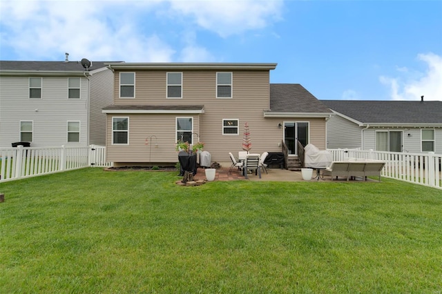 rear view of property featuring a patio, a fenced backyard, a lawn, and an outdoor hangout area