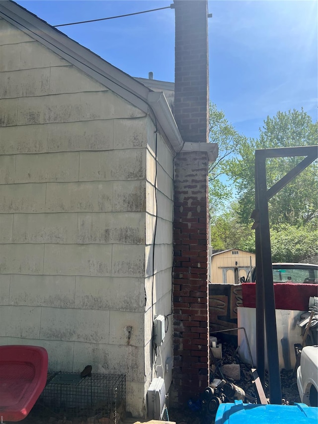 view of home's exterior featuring a chimney