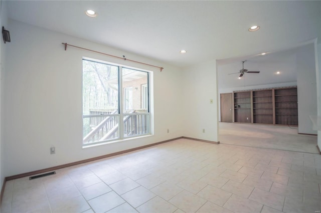 unfurnished room with visible vents, recessed lighting, and a wealth of natural light