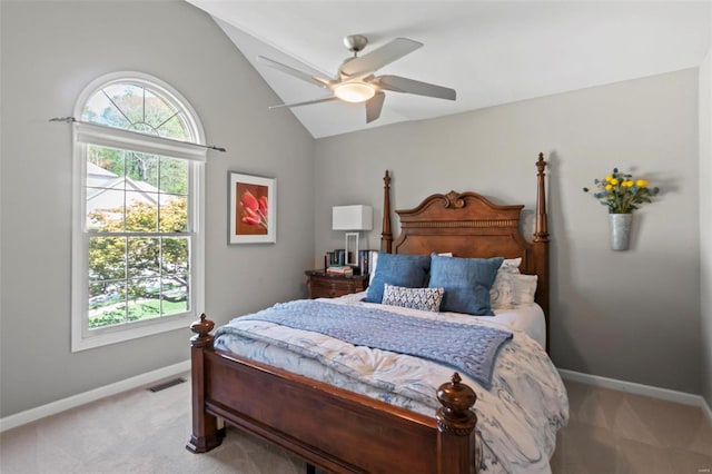 bedroom with ceiling fan, light colored carpet, baseboards, vaulted ceiling, and visible vents
