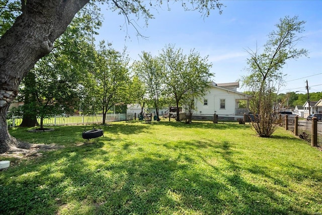 view of yard with a fenced backyard