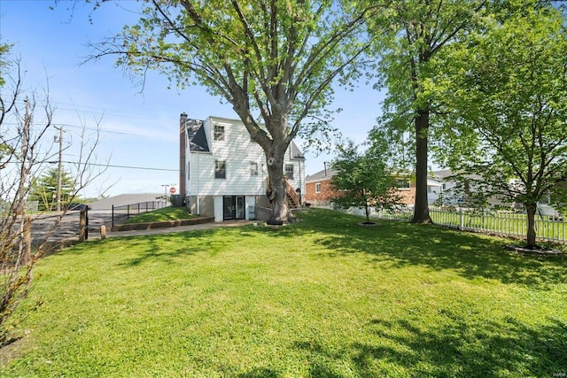 view of yard featuring a fenced backyard