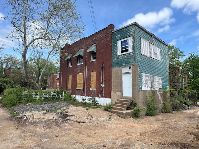 view of front property featuring entry steps