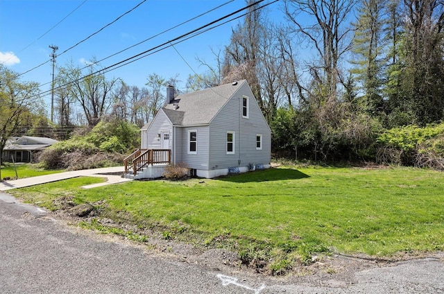 view of property exterior featuring a chimney, a yard, and roof with shingles