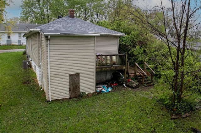 view of outbuilding featuring cooling unit