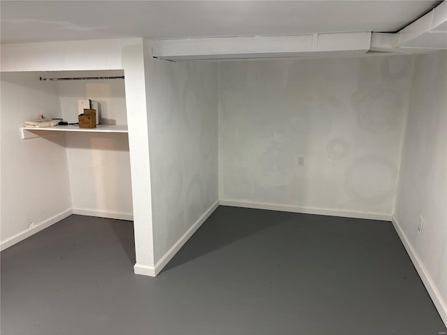 below grade area featuring baseboards