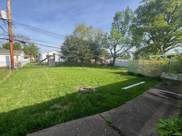 view of yard with fence