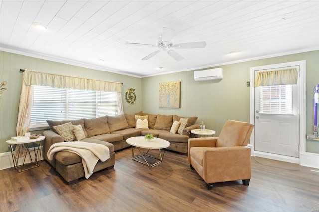 living room featuring dark wood-style floors, a wall mounted AC, and ornamental molding