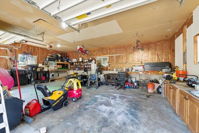 garage with a workshop area