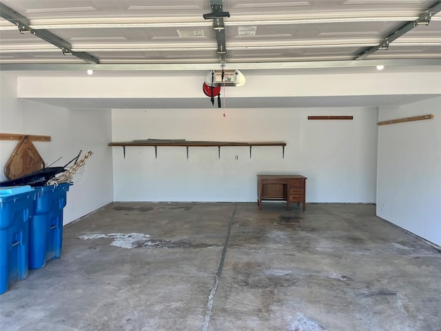 garage featuring a garage door opener