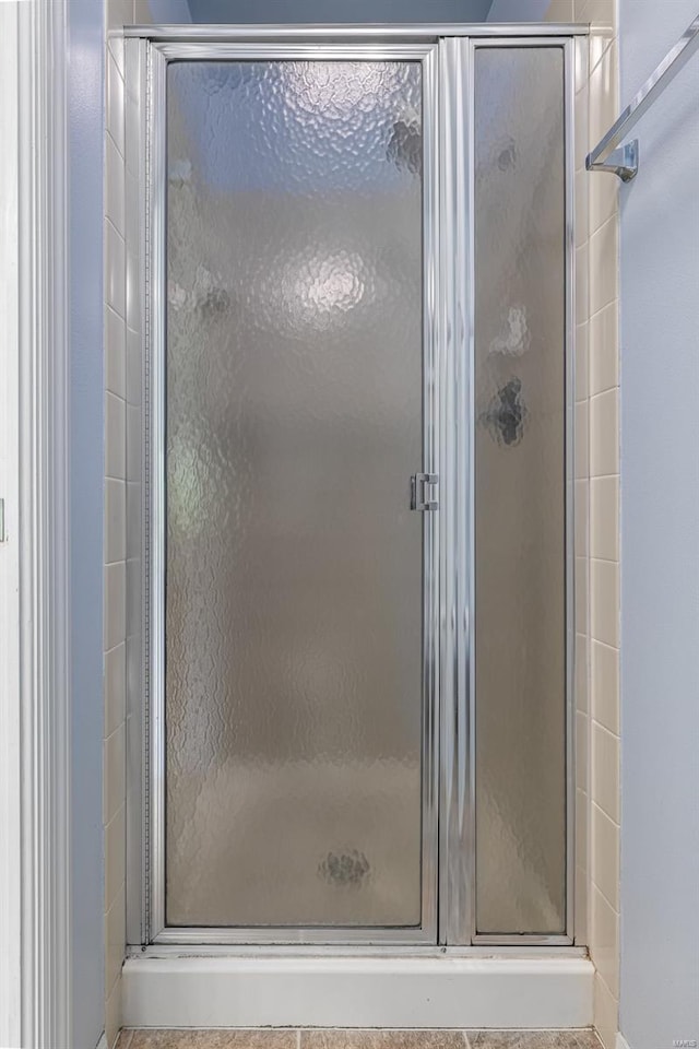 full bath featuring a stall shower