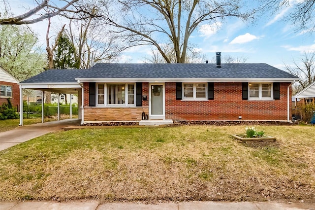 ranch-style home featuring brick siding, roof with shingles, and a front lawn