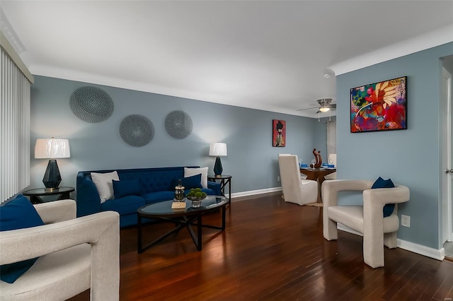 living room with baseboards, ceiling fan, and wood finished floors
