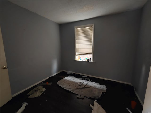 empty room with baseboards