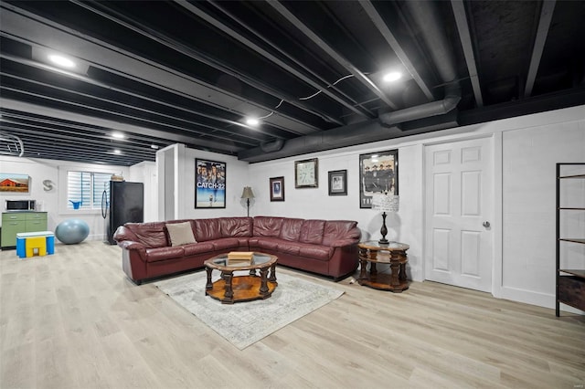 living area with wood finished floors