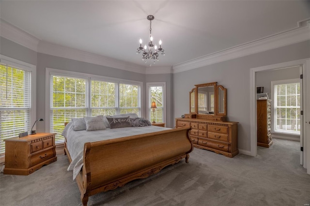 bedroom featuring ornamental molding, an inviting chandelier, and light colored carpet