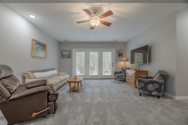 living area featuring baseboards, recessed lighting, a ceiling fan, and carpet flooring