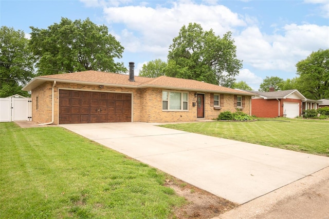 single story home featuring brick siding, a garage, concrete driveway, a front yard, and a gate