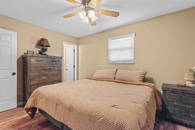 bedroom featuring wood finished floors and ceiling fan