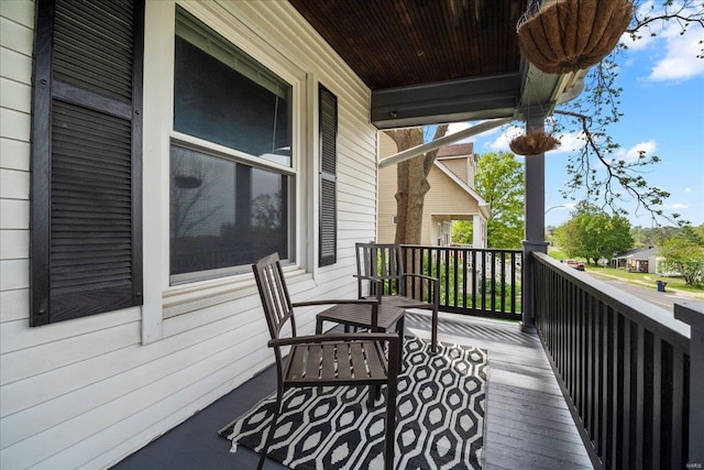 balcony featuring a porch