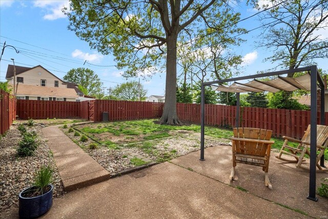 view of yard featuring a patio and a fenced backyard