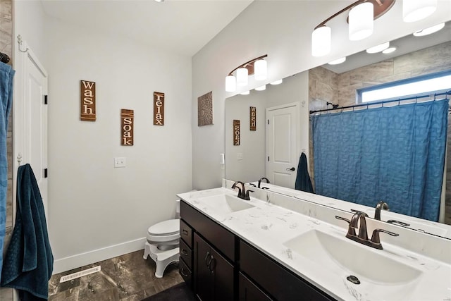 full bathroom with visible vents, a sink, baseboards, and marble finish floor