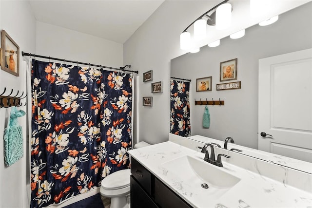 full bath with toilet, a shower with shower curtain, and vanity