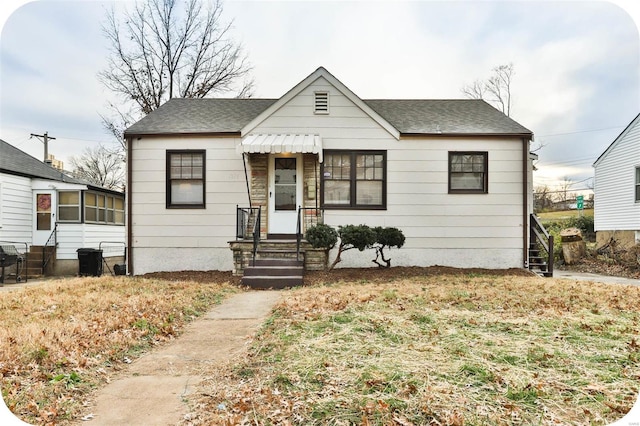 bungalow with roof with shingles