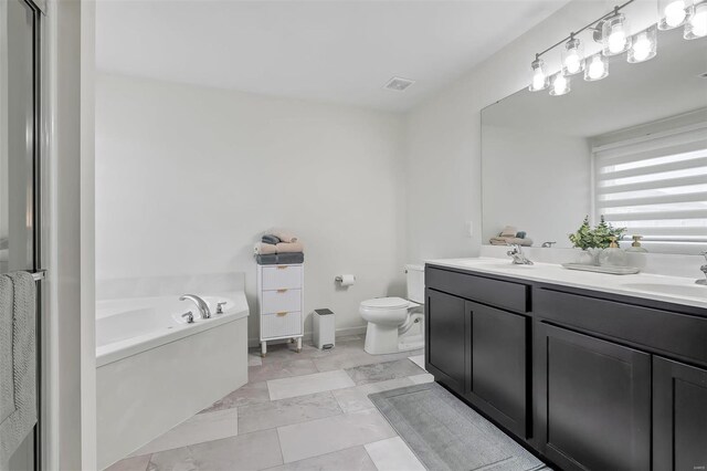 bathroom featuring a sink, double vanity, toilet, visible vents, and a bath