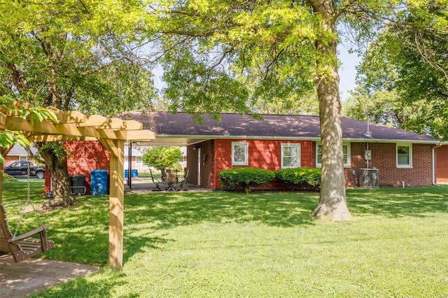 ranch-style house with brick siding and a front yard