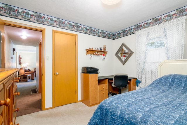 bedroom featuring carpet floors and visible vents