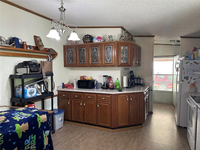 kitchen featuring light countertops, a textured ceiling, white appliances, and ornamental molding