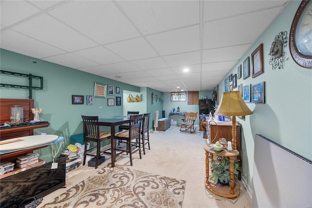 dining area with carpet flooring, recessed lighting, baseboards, and a drop ceiling